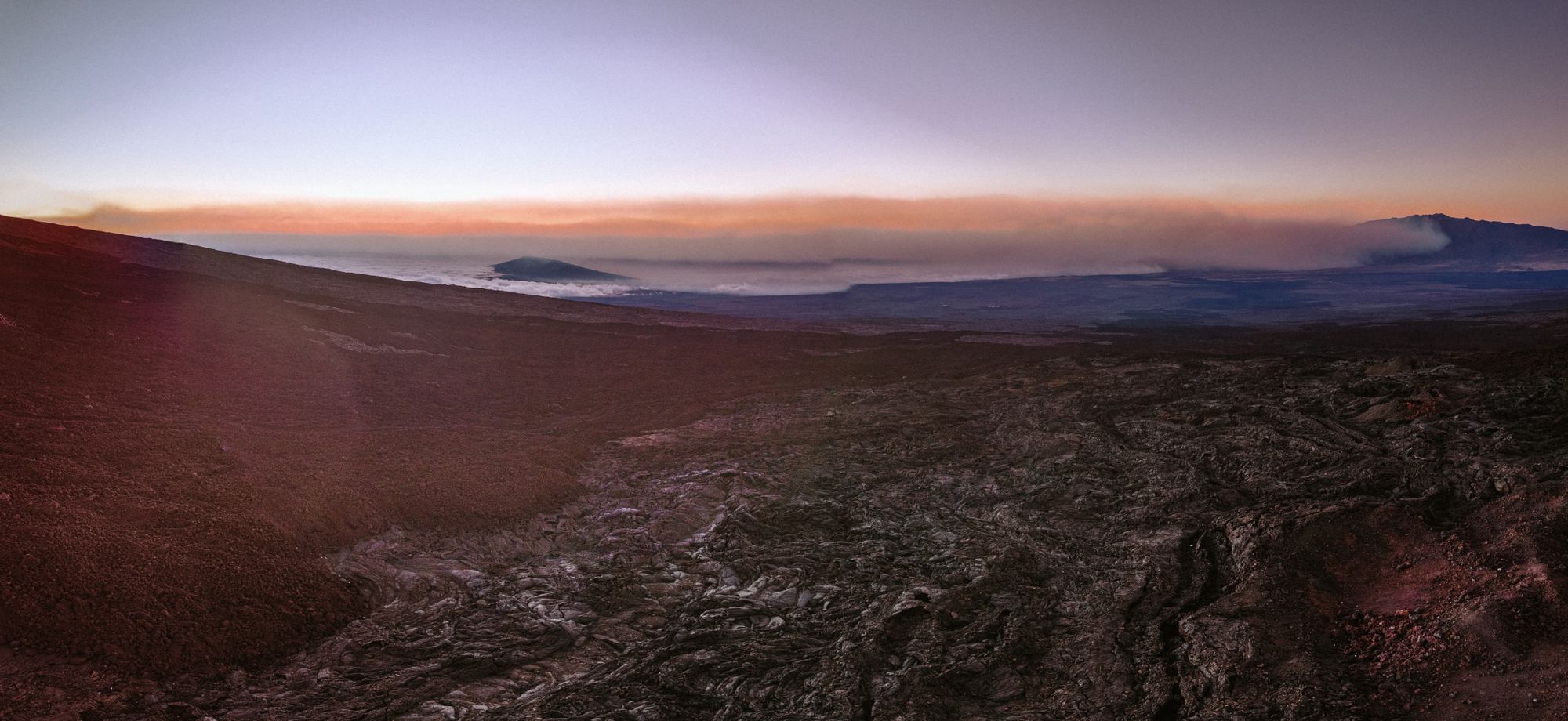 Landscape photo from a volcano, showing the rough rocky terrain from a late-20th century eruption.